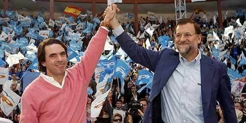 José María Aznar y Mariano Rajoy en un acto de campaña.
