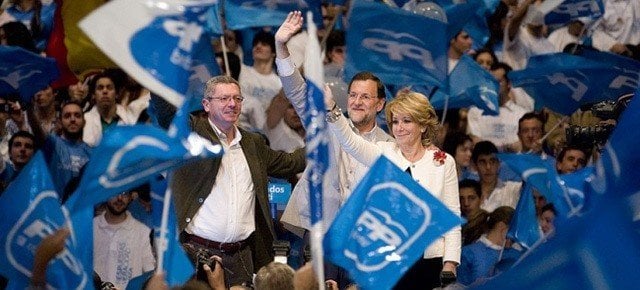 Esperanza Aguirre, junto a Rajoy y Gallardón.
