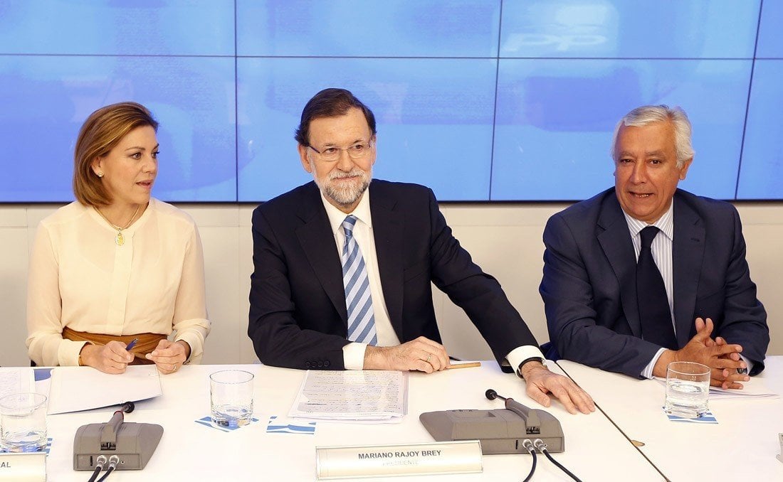 Rajoy, flanqueado por Cospedal y Arenas en la Junta Nacional del PP.