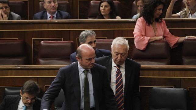 José Manuel García-Margallo y Luis de Guindos.