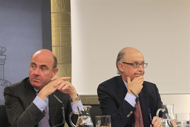De Guindos y Montoro, en Moncloa.