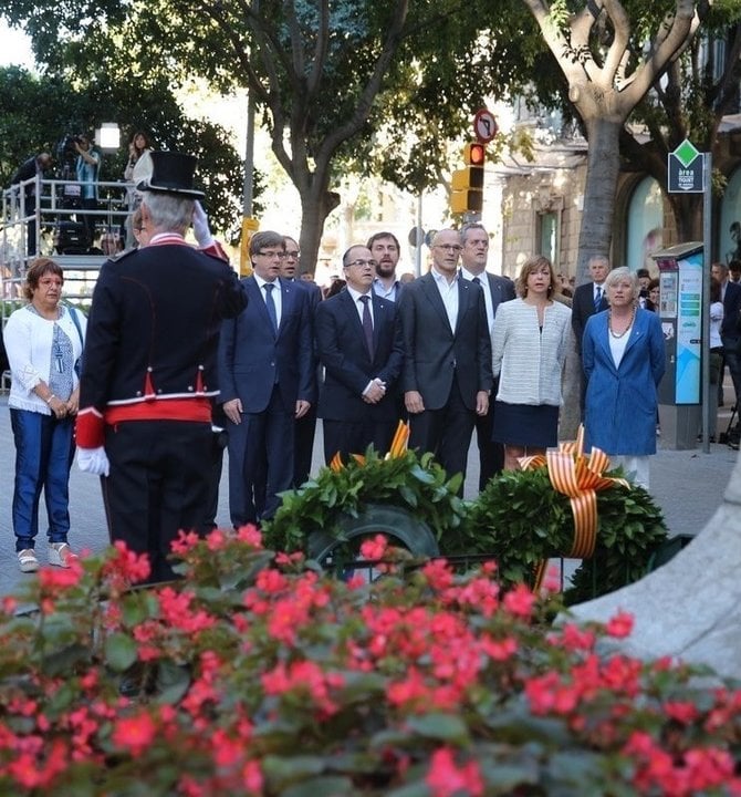 Carles Puigdemont y consejero de su gobierno, en la Diada del 11 de septiembre.