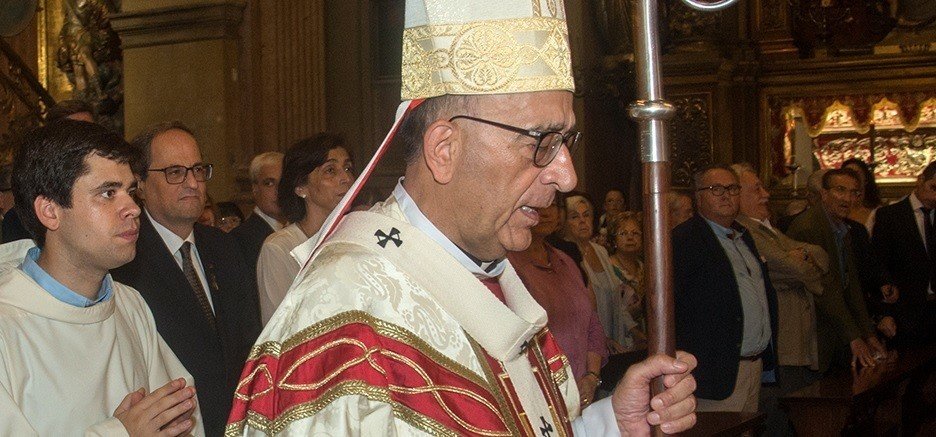 El cardenal arzobispo Juan José Omella, con Quim Torra a la izquierda.