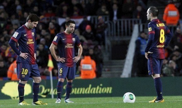 Messi, Xavi e Iniesta.