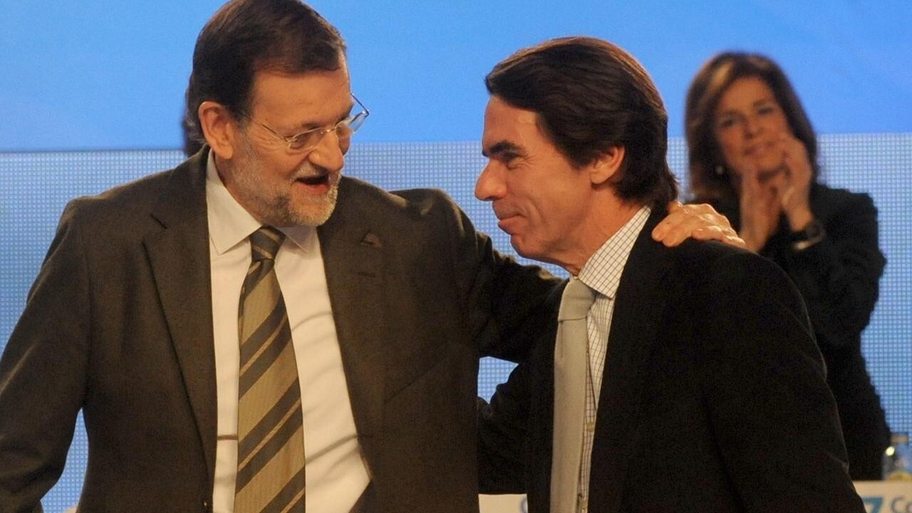 Rajoy y Aznar en el congreso de Sevilla.
