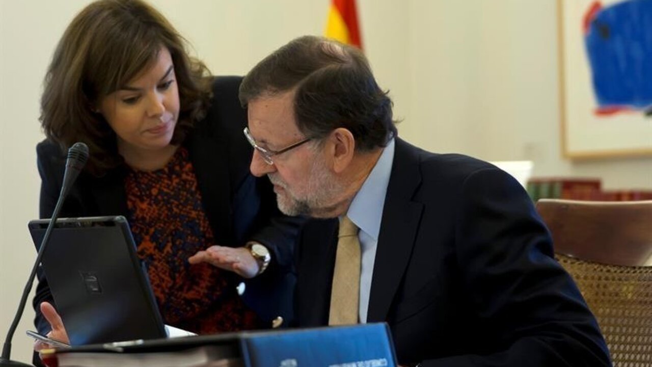 Soraya S&aacute;enz de Santamar&iacute;a y Mariano Rajoy.