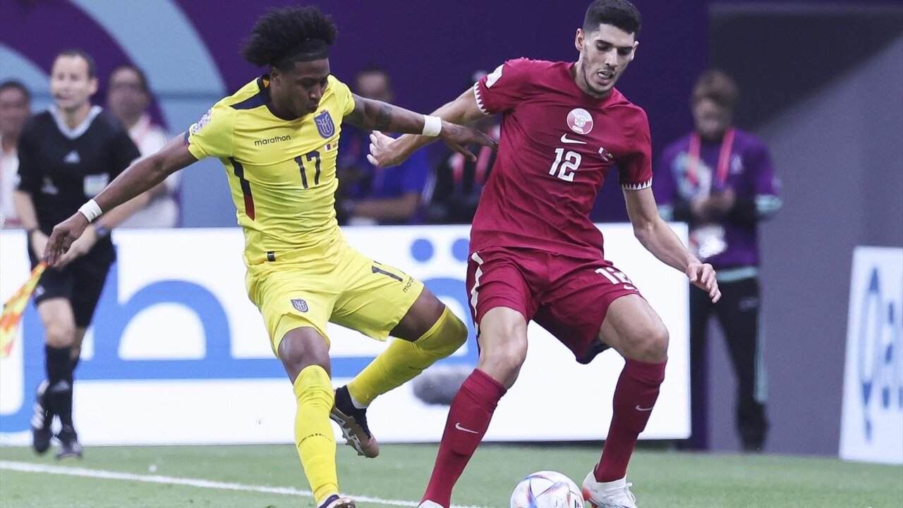 Angelo Preciado of Ecuador vies with Karim Boudiaf of Qatar during the FIFA World Cup 2022, Group A football match between Qatar and Ecuador on November 20, 2022 at Al Bayt Stadium in Al-Khor, Qatar - Photo Jean Ian MacNicol / Colorsport / DPPI