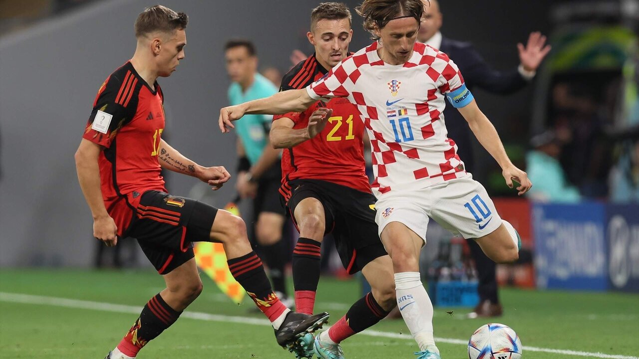 01 December 2022, Qatar, Al Rayyan: Croatia's Luka Modric (R) in action during the FIFA World Cup Qatar 2022 Group F soccer match between Croatia and Belgium at Ahmad bin Ali Stadium. Photo: Bruno Fahy/BELGA/dpa