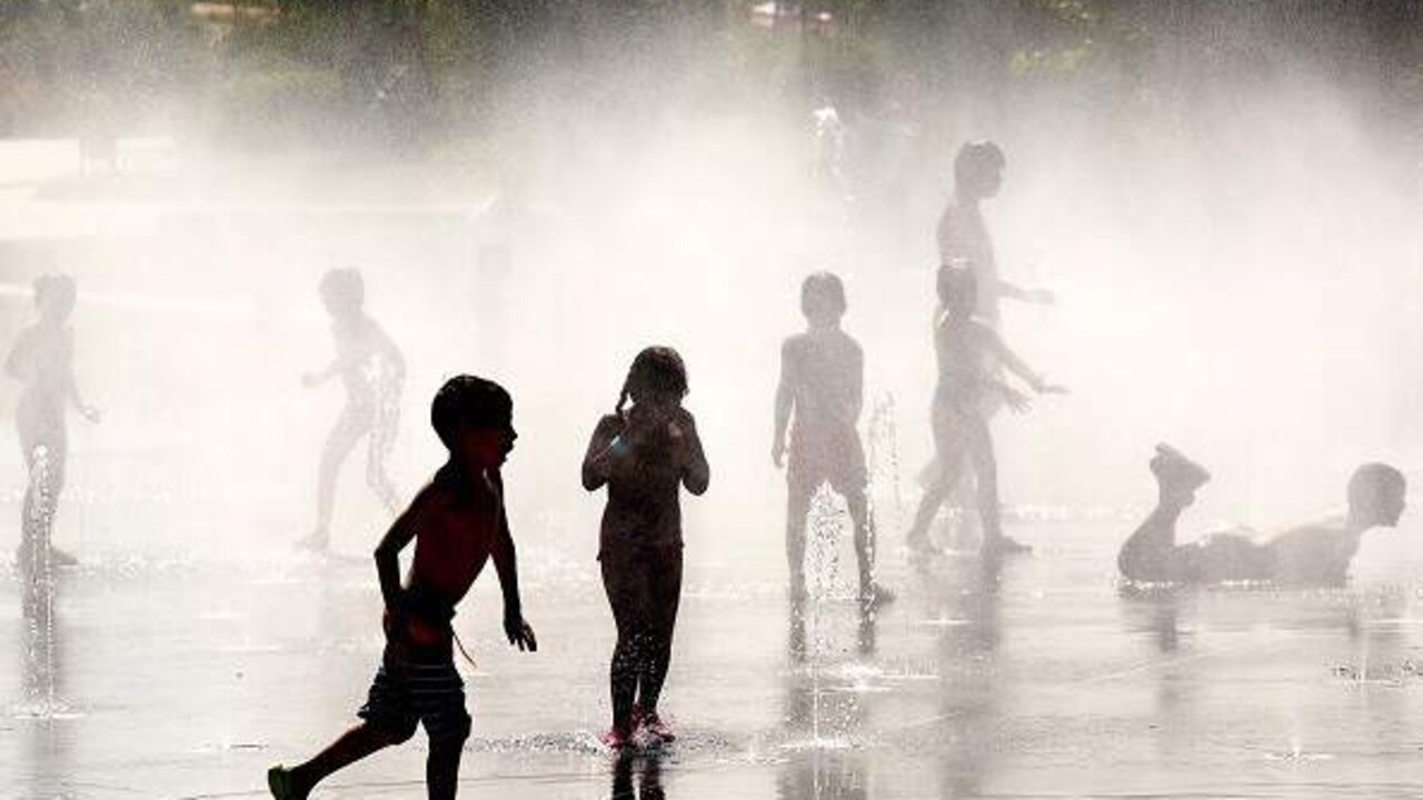 MADRID, SPAIN - JULY 21:  Children cool off as they play under a fountain next to the Manzanares river on July 21, 2015 in Madrid, Spain. A third heat wave this summer has seen hot weather alerts issued in 18 provinces across Spain. This July is believed to have been the hottest this century.  (Photo by Pablo Blazquez Dominguez/Getty Images)