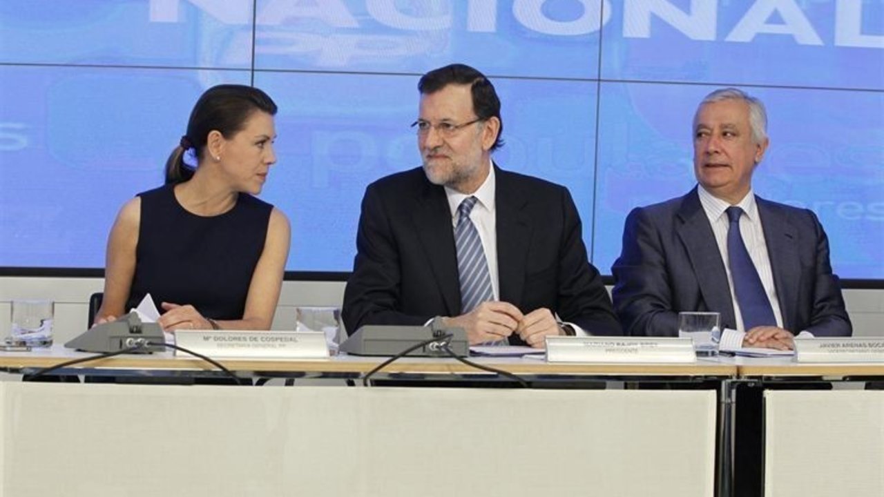Mariano Rajoy, en un Comité Ejecutivo Nacional junto a Cospedal y Arenas.