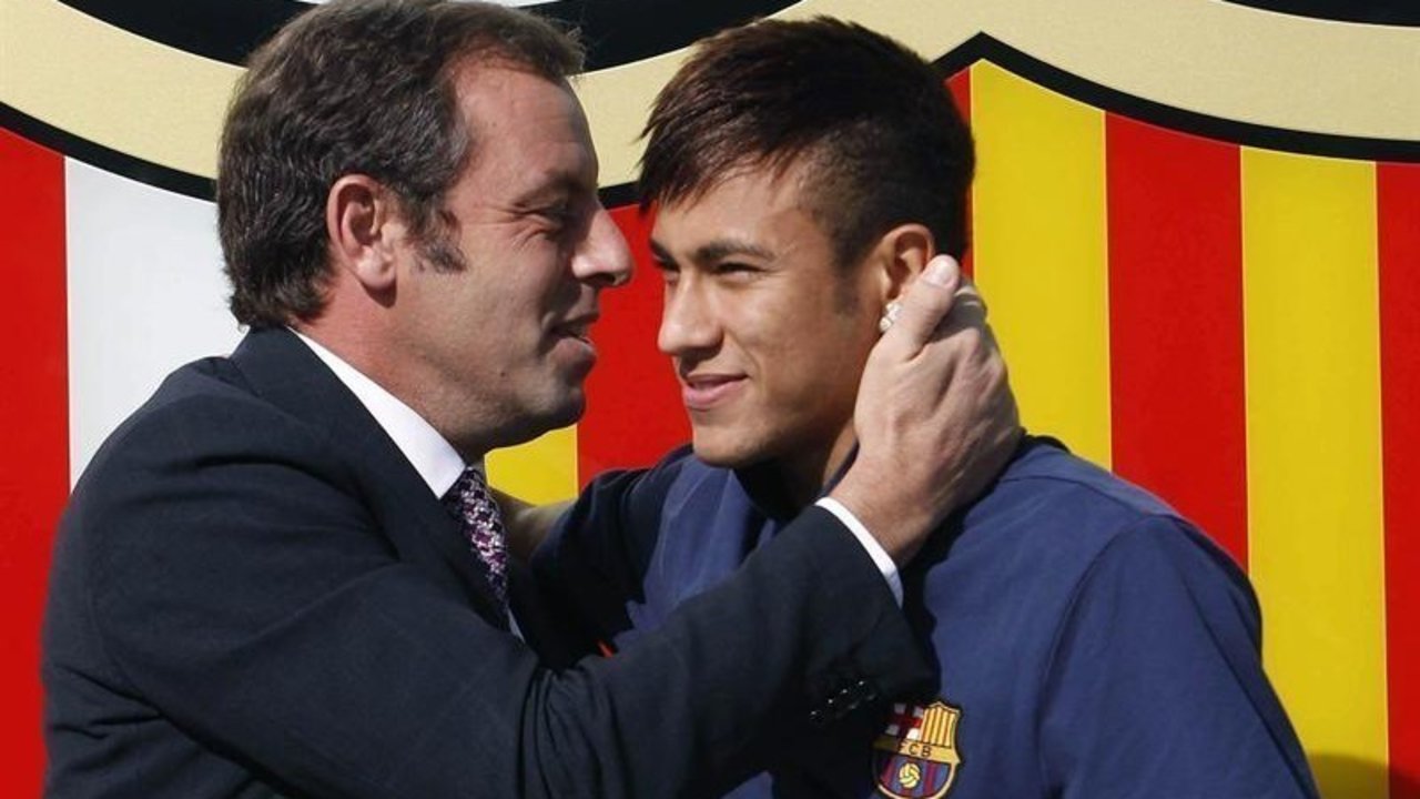 Rosell y Neymar durante la presentación del futbolista brasileño.