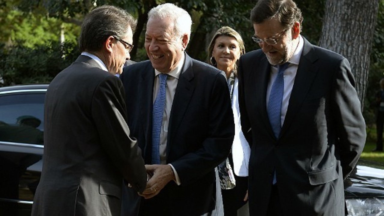 Artur Mas junto a Margallo y Rajoy.