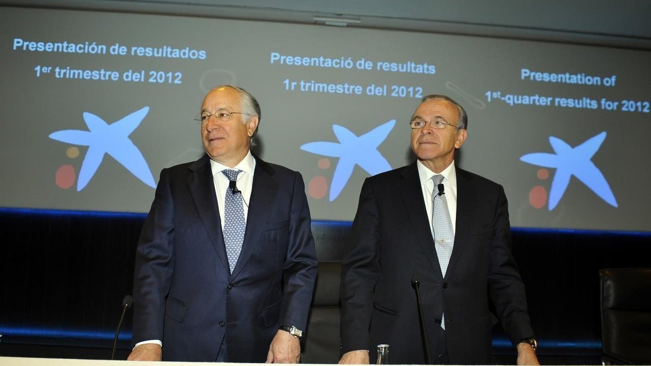 El consejero delegada de Caixabank, Juan María Nin, y el presidente, Isidro Fainé.