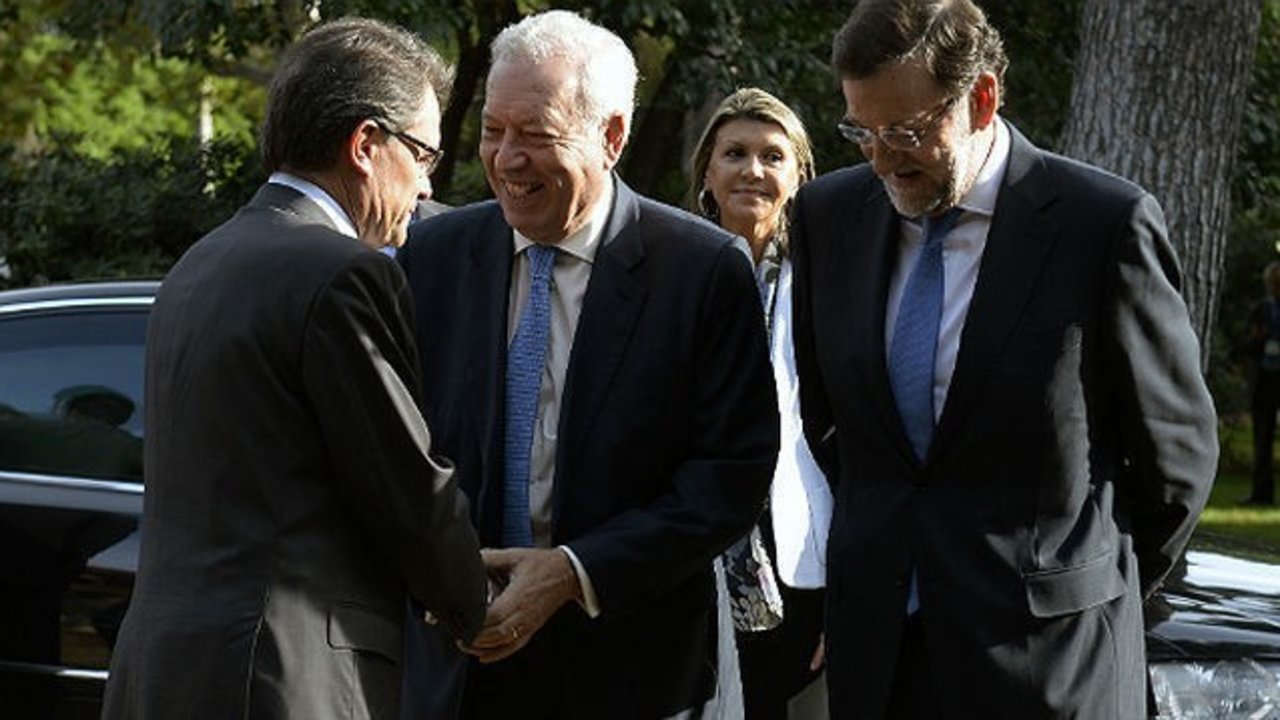 Mas, con Margallo y Rajoy.