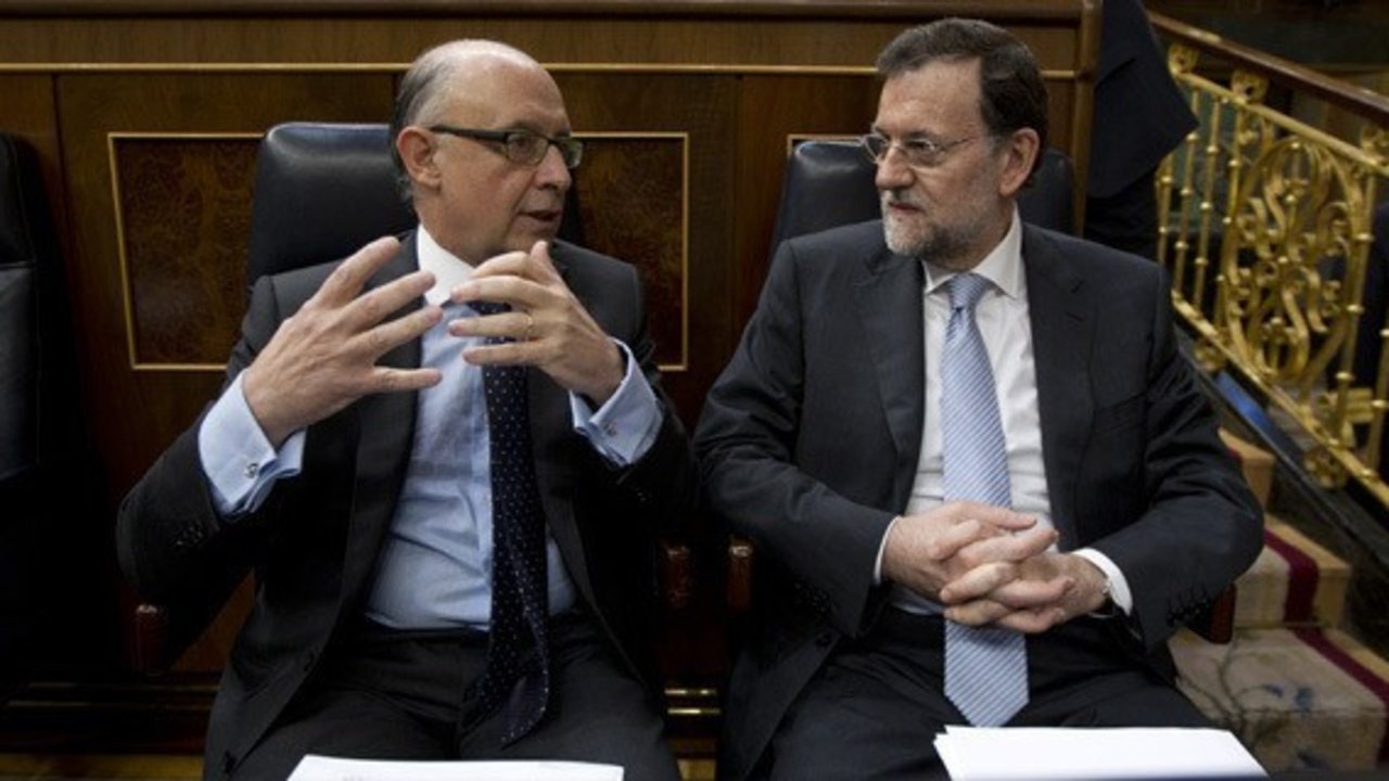Cristóbal Montoro y Mariano Rajoy.