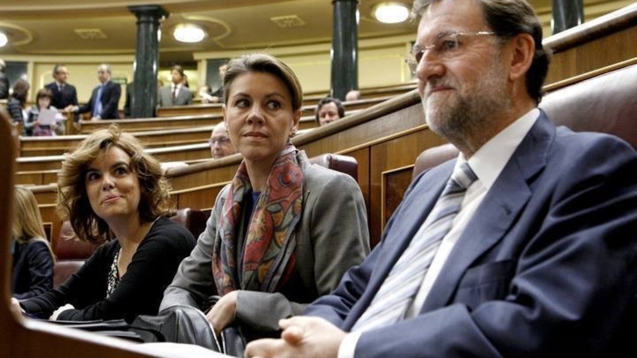 Soraya, Cospedal y Rajoy.
