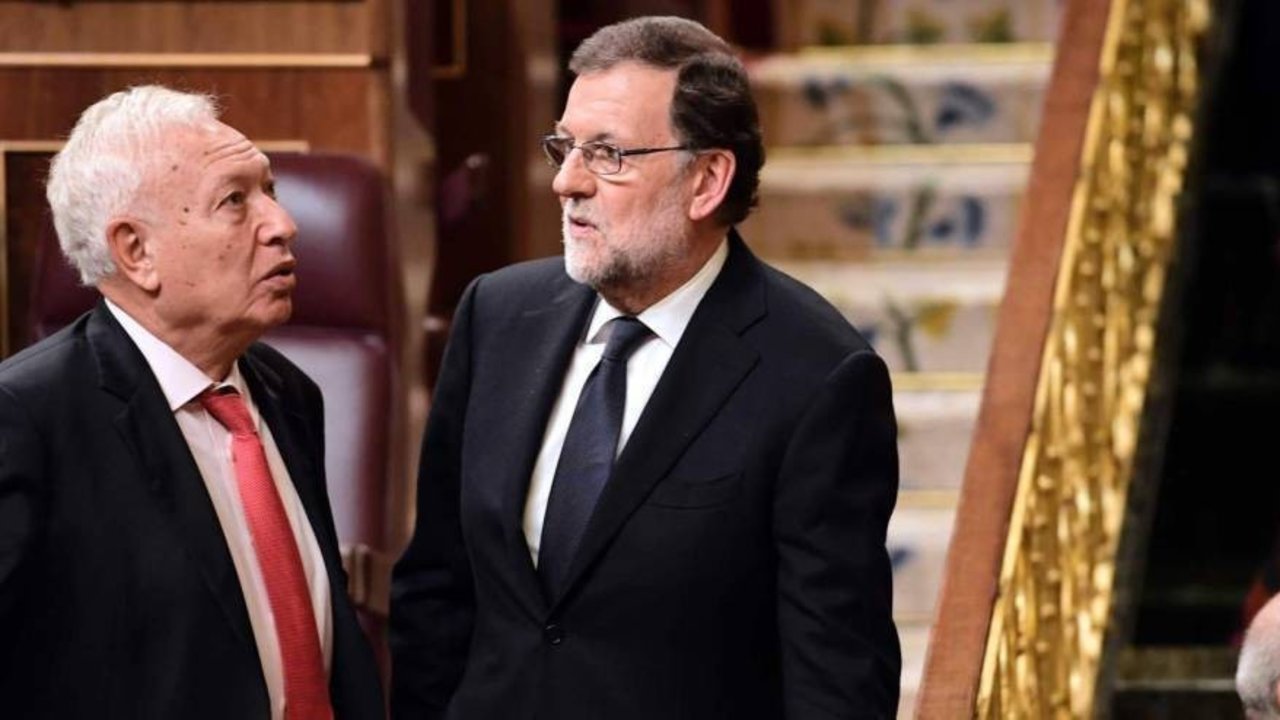 José Manuel García-Margallo y Mariano Rajoy.