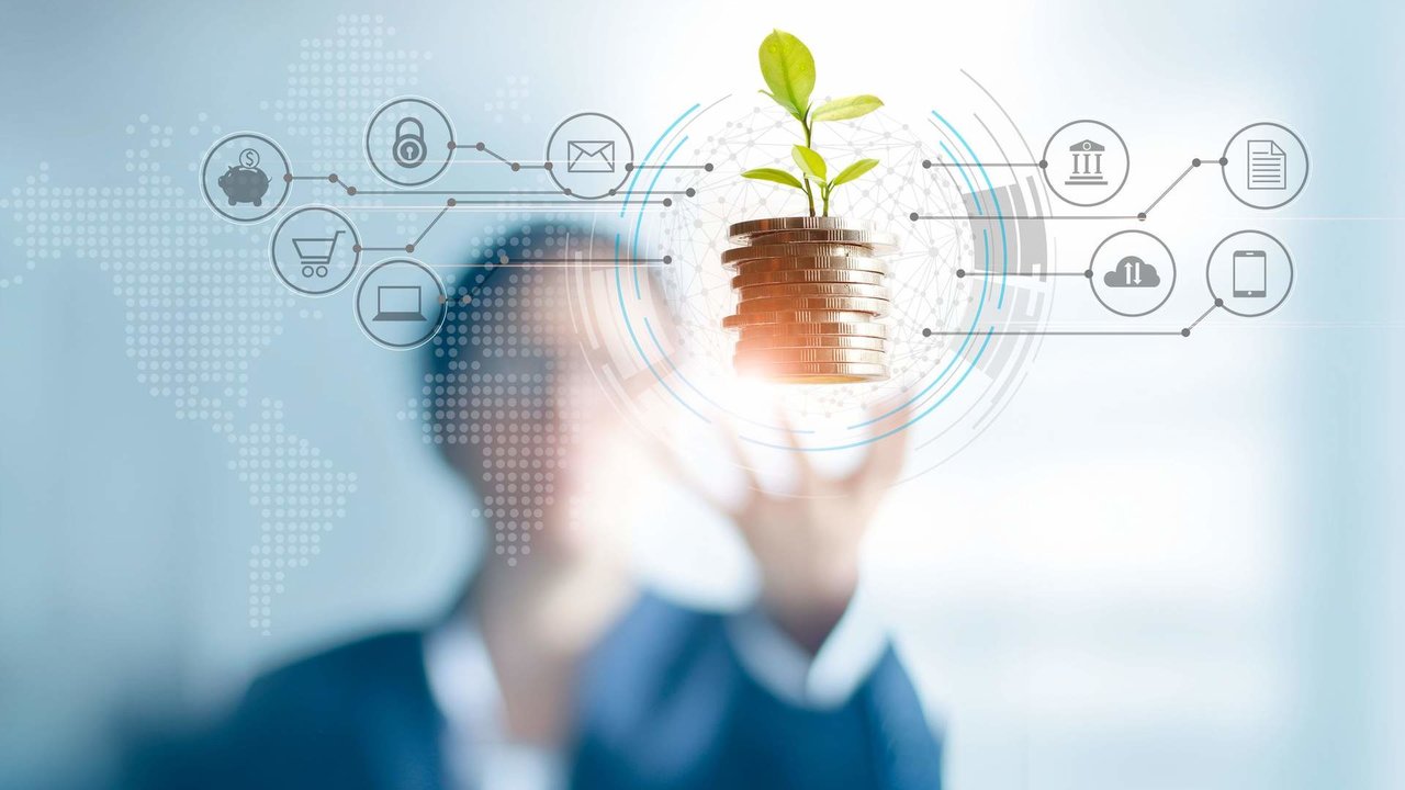 Businessman holding a tree sprout growing on coins, abstract growth investing. Finance and icon customer, banking network connection on interface, digital marketing, investment growth and business technology concept