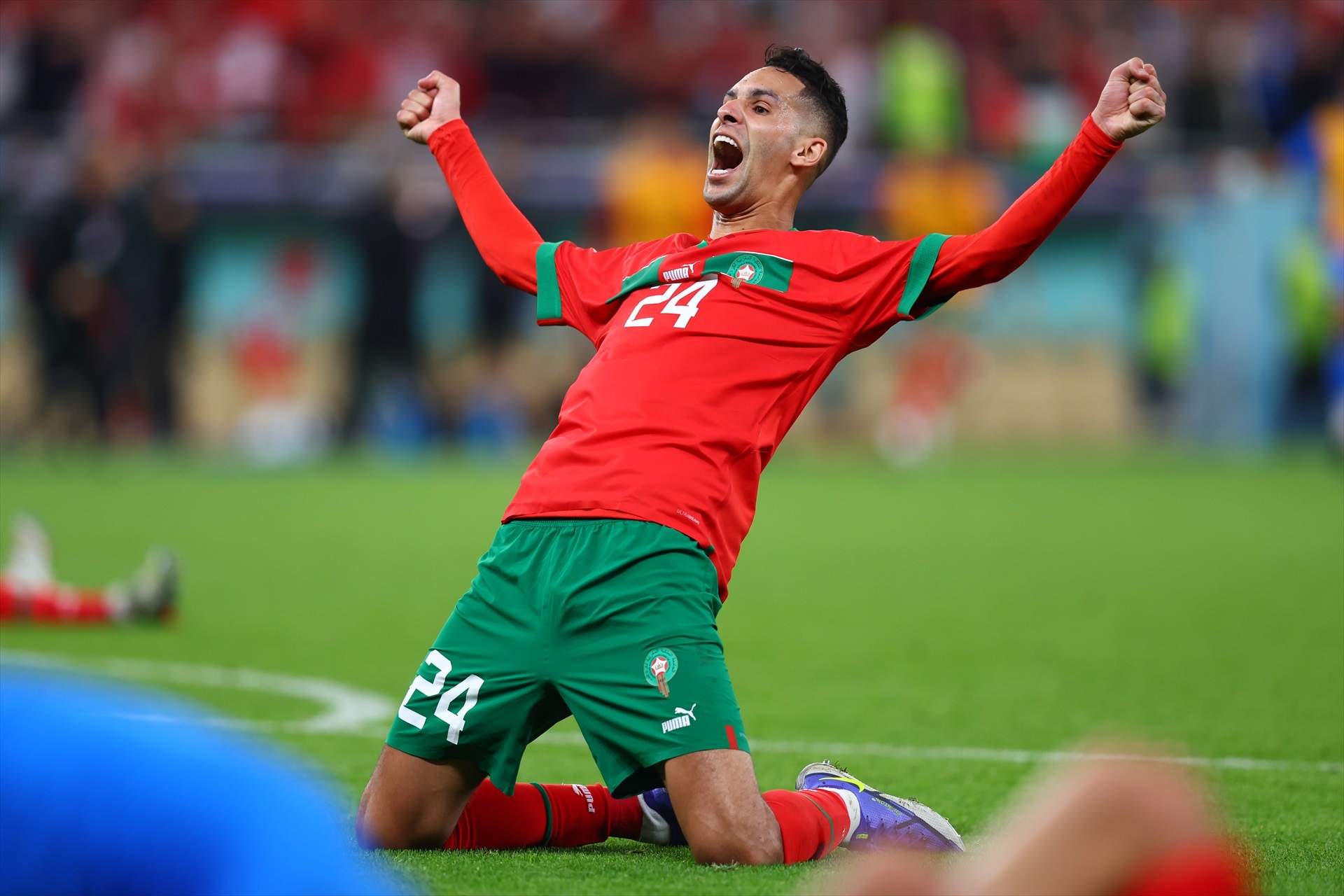 10 December 2022, Qatar, Doha: Morocco's Badr Benun cheers after victory in the FIFA World Cup Qatar 2022 Quarter-Final soccer match between Morocco and Portugal at Al-Thumama stadium. Photo: Tom Weller/dpa