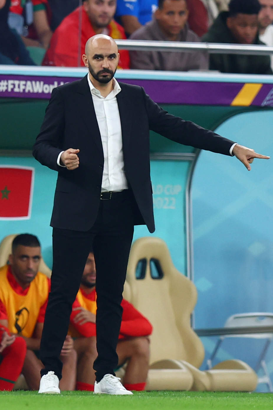 10 December 2022, Qatar, Doha: Morocco's coach Walid Regragui gestures on the sidelines during the FIFA World Cup Qatar 2022 Quarter-Final soccer match between Morocco and Portugal at Al-Thumama stadium. Photo: Tom Weller/dpa